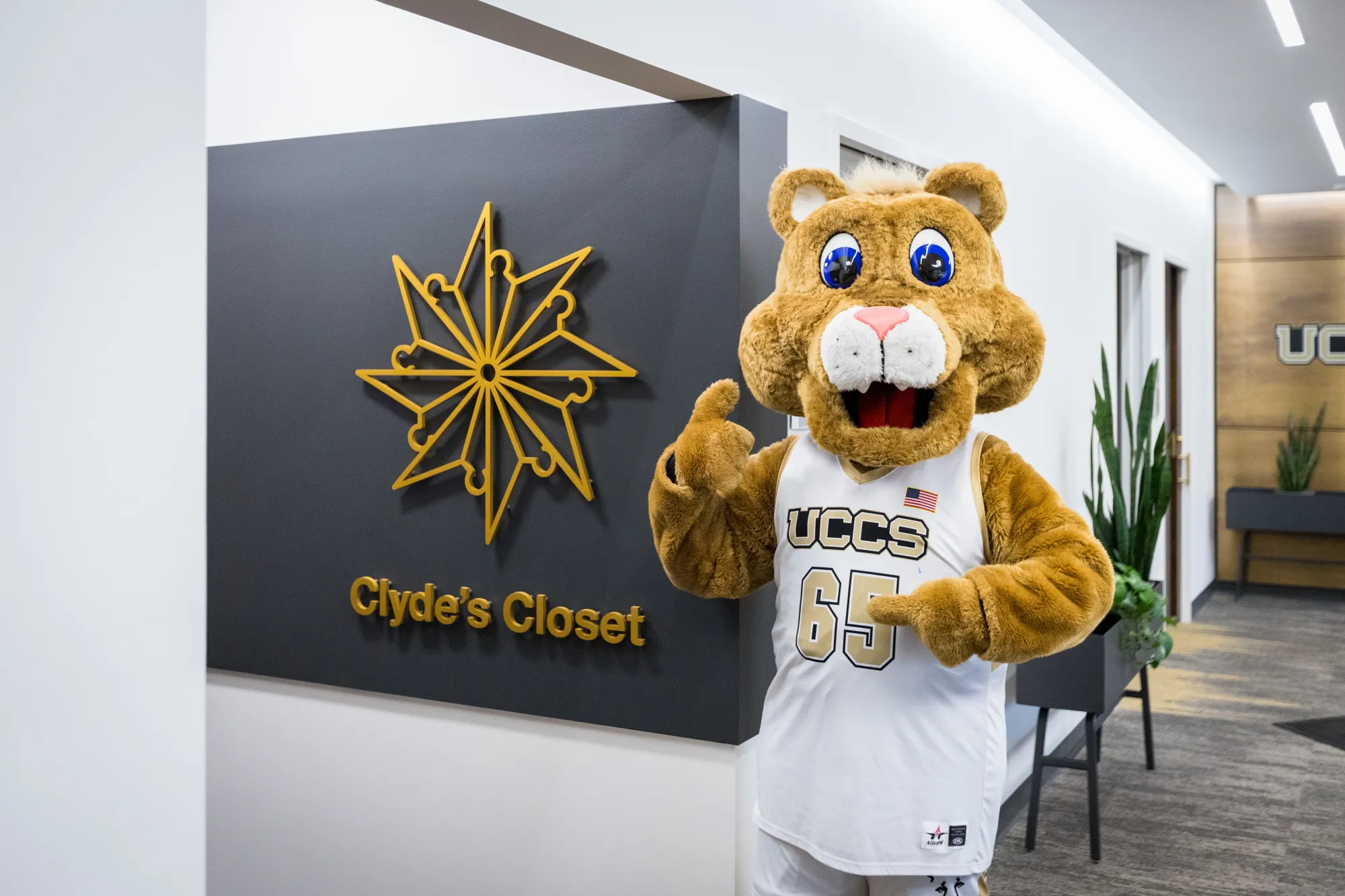 Clyde in front of Clyde's Closet in the UCCS Career Center