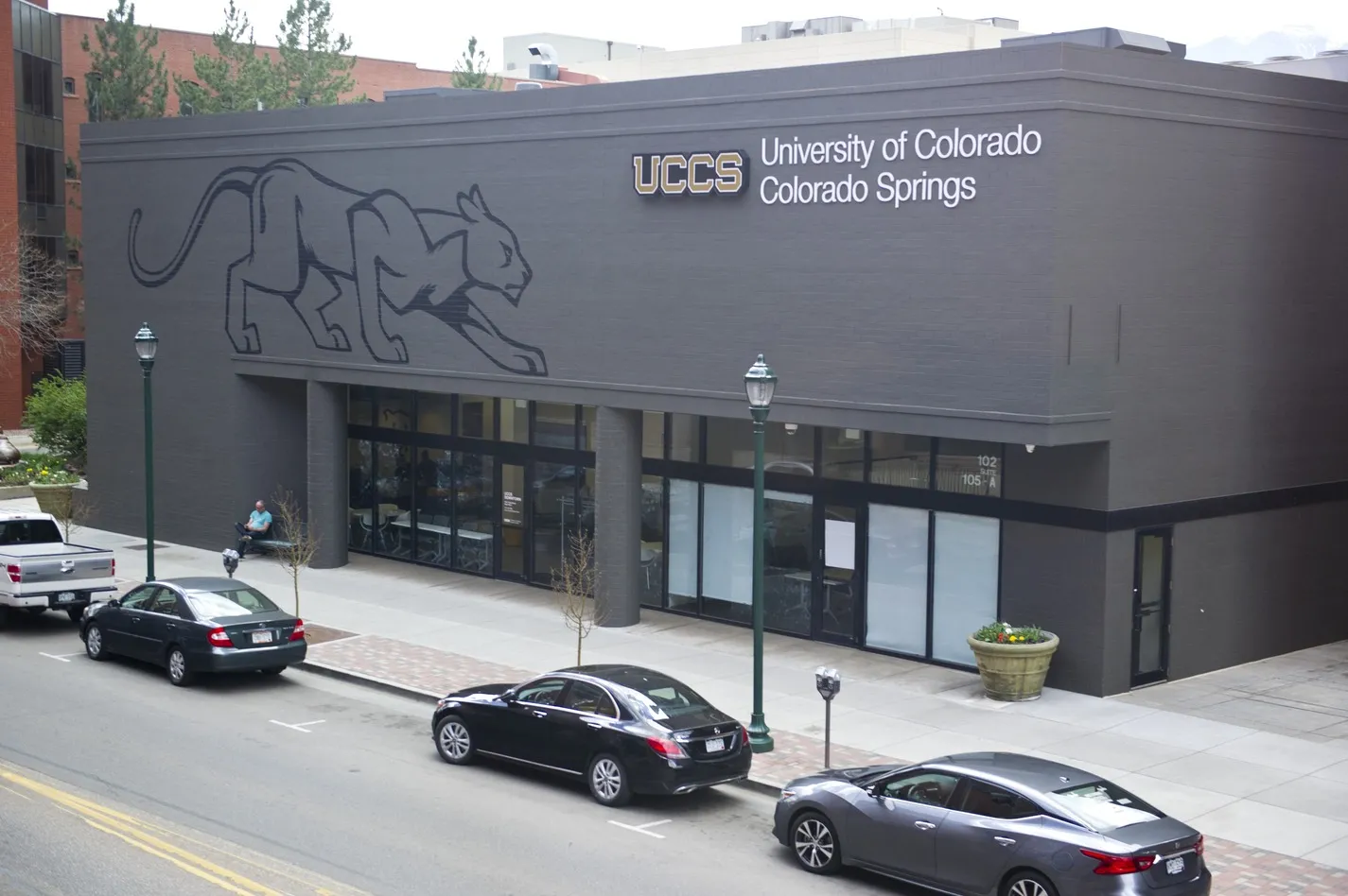 UCCS Downtown location with cars in front.