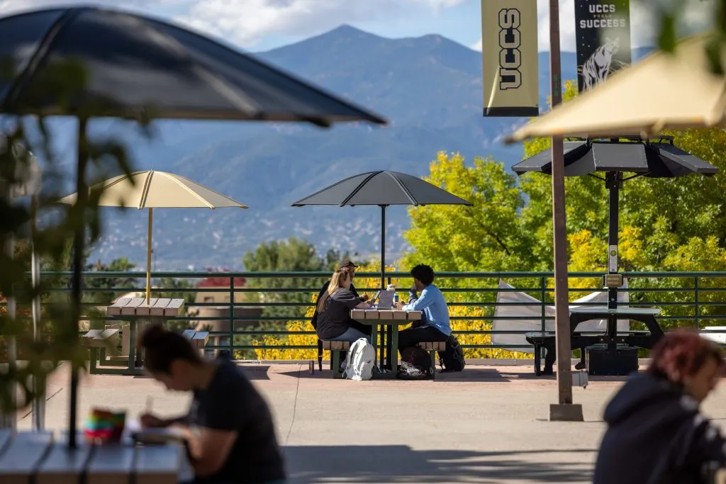 UCCS Students Sitting Outside of Centennial Hall